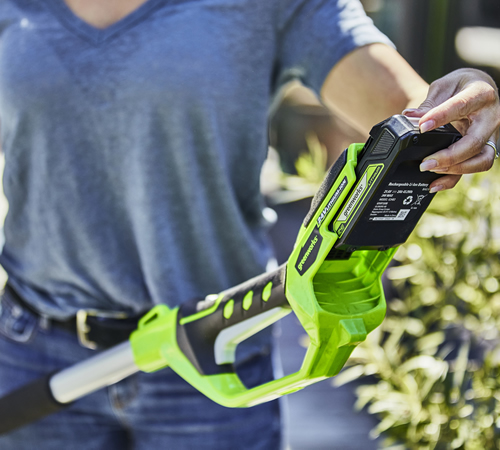 psudpyxqfth.jpg - Mowers Online Cordless string trimmer with neon yellow housing